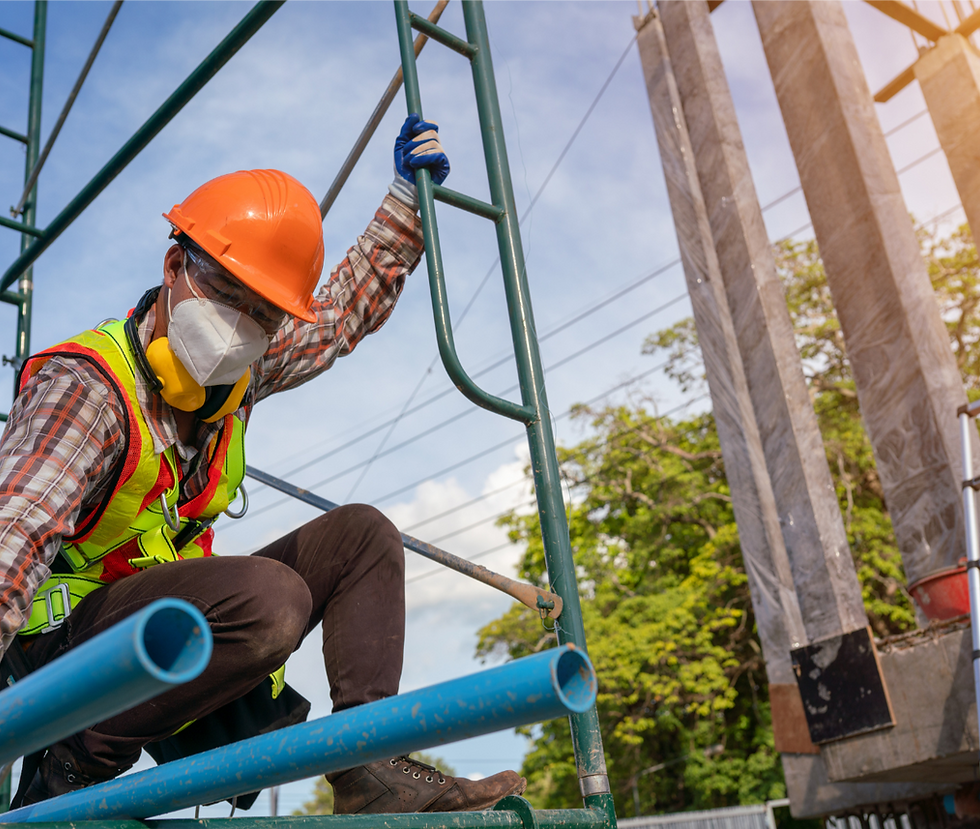 Workers on scaffolding at construction site