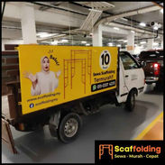 Delivery truck with scaffolding